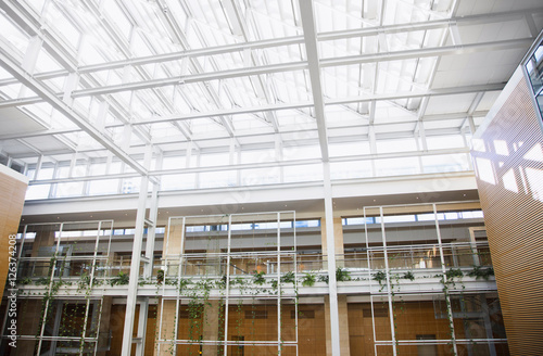 Photography Glass wall in the office building. Modern sunny empty loft room