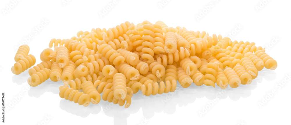Pile of spiral pasta closeup isolated on white. Pile of spiral pasta closeup isolated on white.