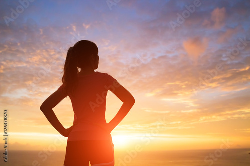 silhouette of woman with sunlight