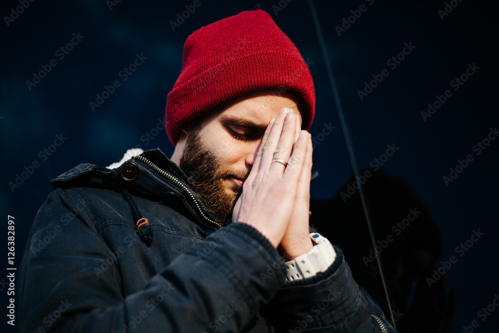 Man praying outside to God Man praying outside to God