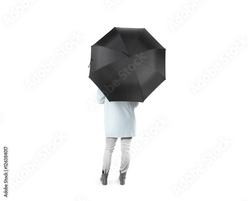 Lady stand backwards with black blank umbrella opened mockup, clipping path. Female person hold clear umbel overhead. Plain surface gamp mockup. Man holding protective accesory gingham cover handle.