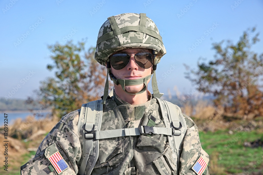 Portrait of soldier at military firing range
