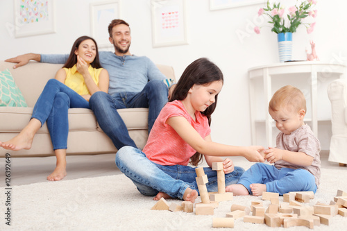 Cute kids playing games at ...
