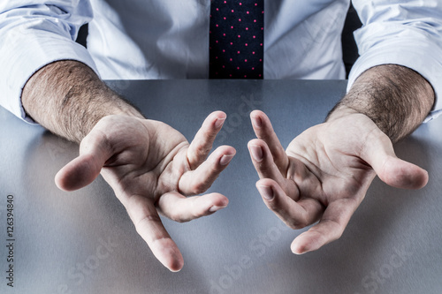 anonymous businessman, salesman or politician hands for openness and discussion