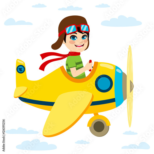 Cute little kid flying a plane on sky