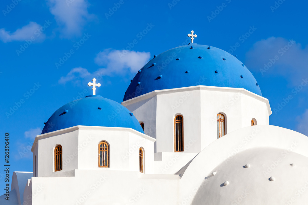 Blue Domes of Orthodox White Church in Perissa, Santorini island
