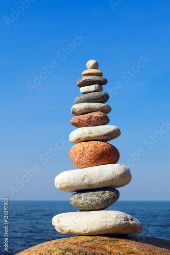 Concept of balance and harmony. stones balance on the background of the sea