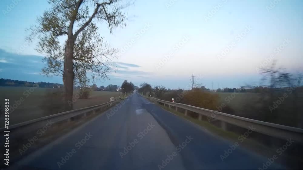 Point of view clip shooted on dashcam in car during driving on rural road. Point of view clip shooted on dashcam in car during driving on rural road.