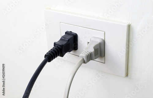 Electric plugs on power socket