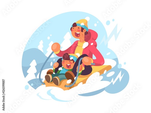 Dad and son sledding © Kit8 d.o.o.