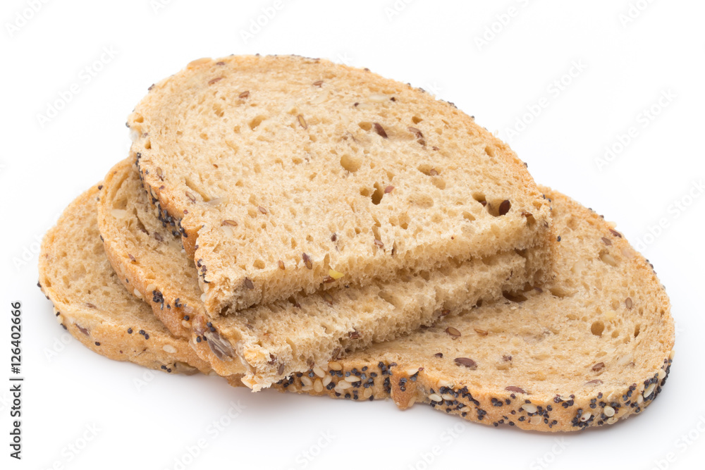 White bread sliced wholegrain bread on a wooden table.