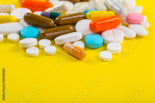 Selection of different pills in form of tablets and capsules