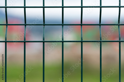 Fotografie green metal grille close up