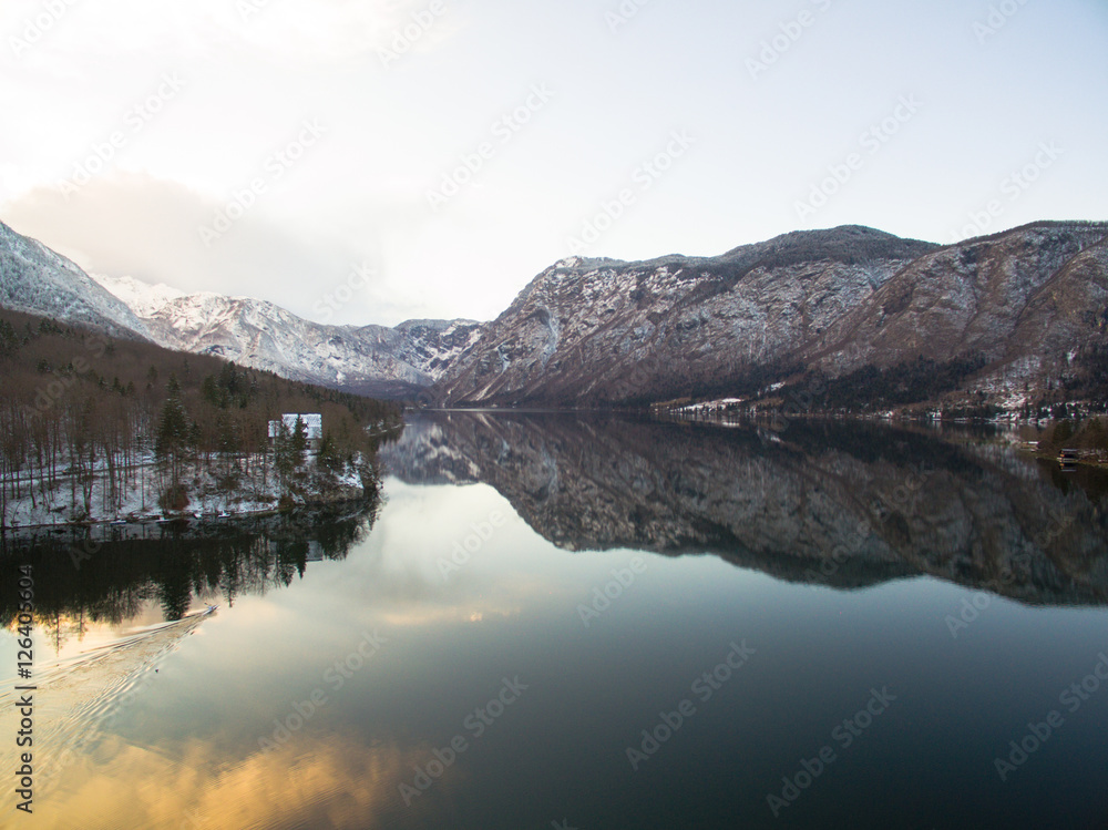 Fototapeta premium Aerial: Beautiful Bohinj Lake At Winter With Mountain Background