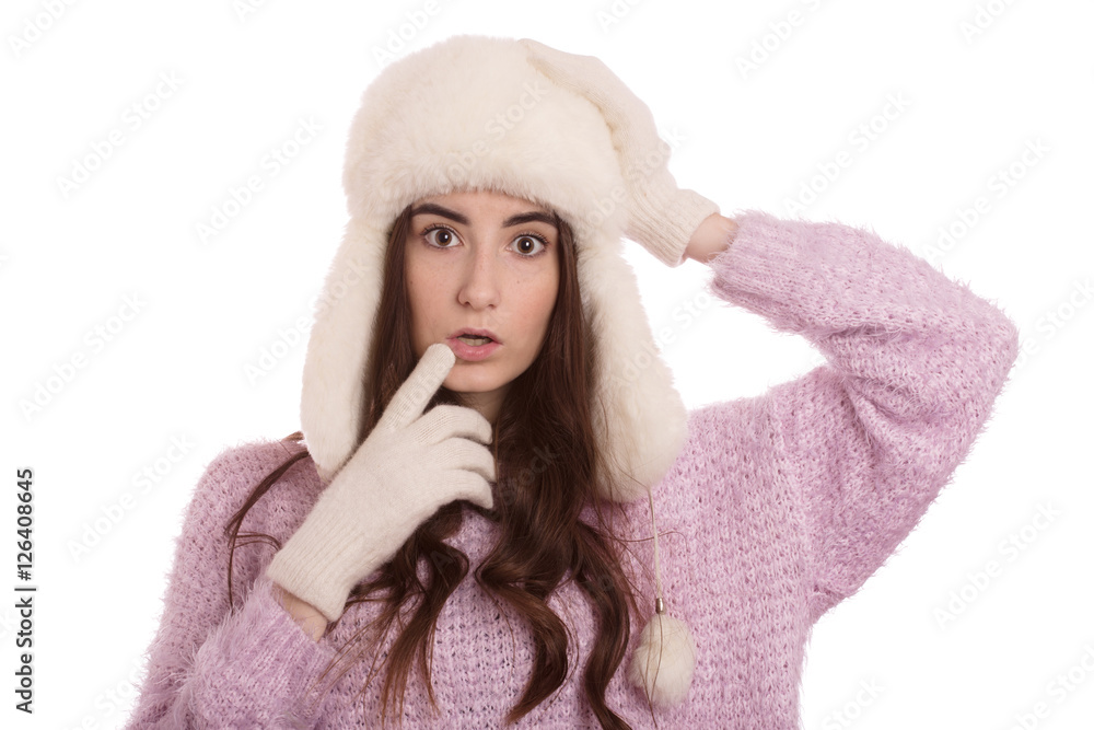 fun shocked girl in winter hat isolated on white background fun shocked girl in winter hat isolated on white background