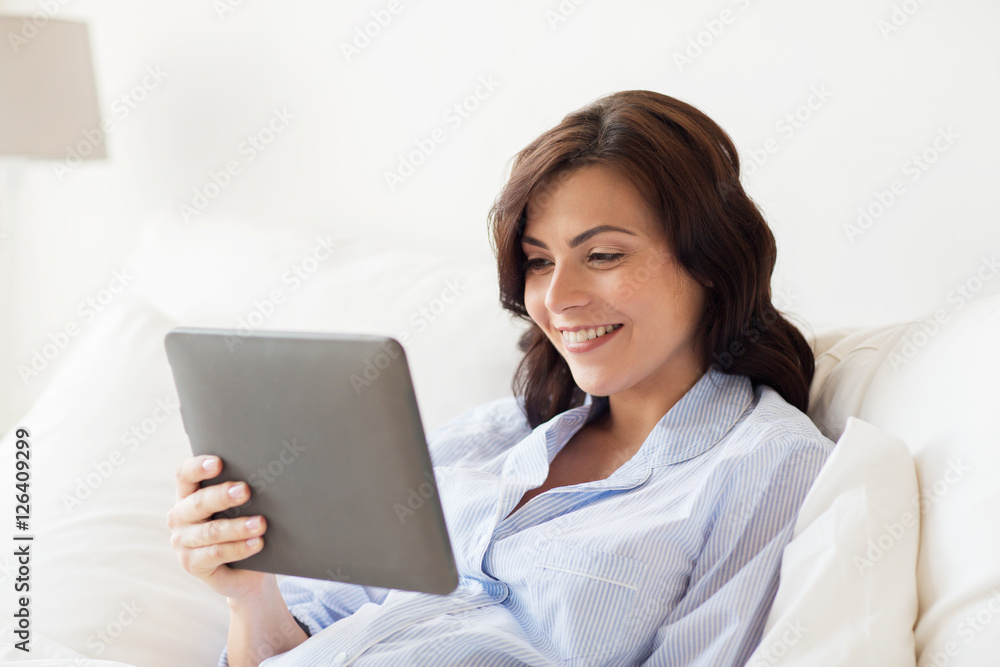 happy pregnant woman with tablet pc at home happy pregnant woman with tablet pc at home