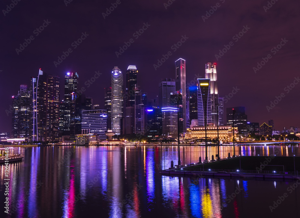 abstract night cityscape at waterfront view and mirror on water - can use to display or montage on product