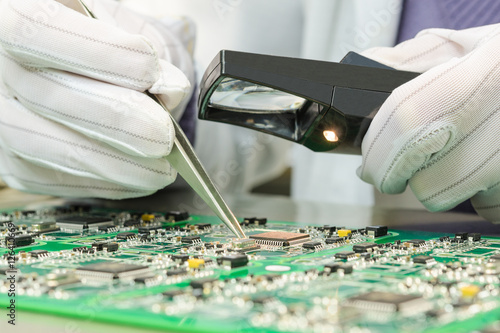 Quality control of electronic components on PCB in laboratory high-tech factory