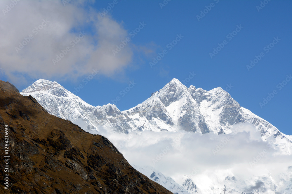 Mount Everest and Lhotse peaks, hiking in Khumbu Valley in Himalayas mountains, Everest Base Camp trek, Nepal.