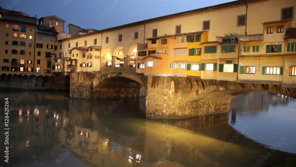 Ponte Vecchio and the Arno river in Florence, Tuscany, Italy Ponte Vecchio and the Arno river in Florence, Tuscany, Italy