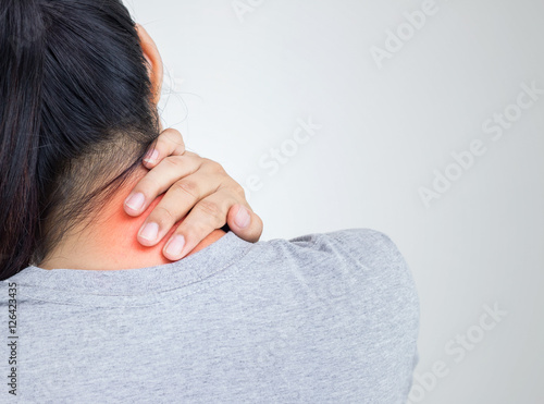 Young woman feeling exhausted and suffering from neck pain, Heal