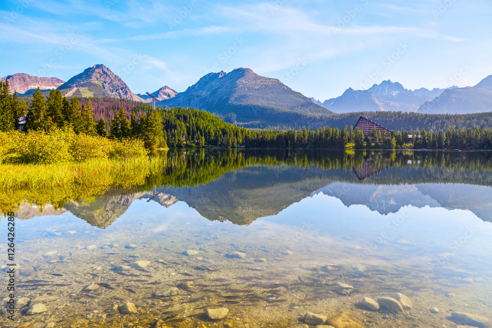 Among the high green mountains there is a lake.