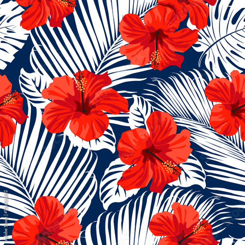Tropical flowers and palm leaves on background. Seamless. Vector pattern. 