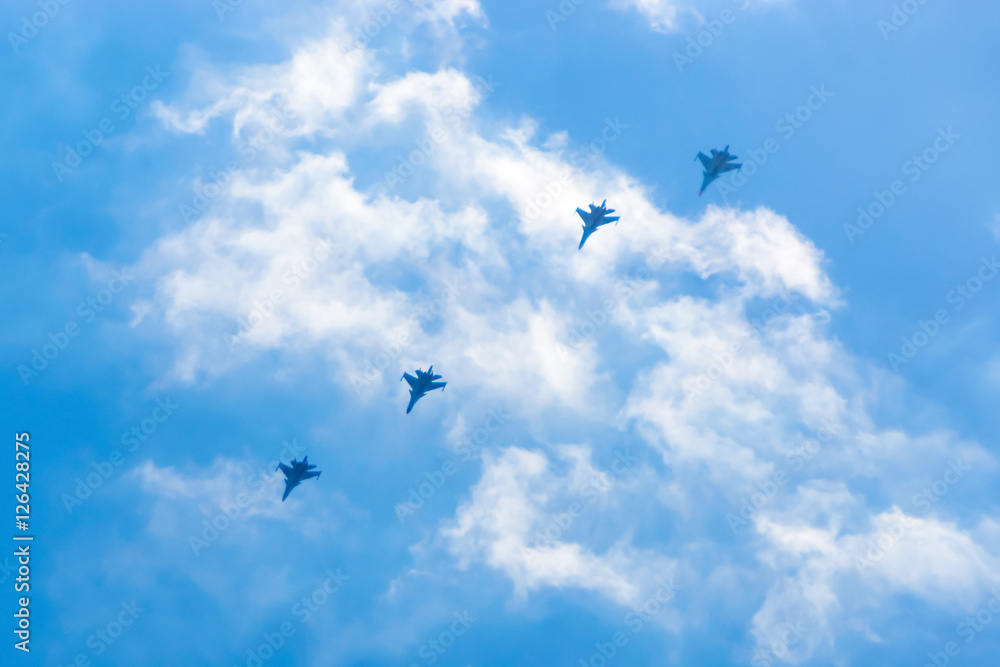 Military aircrafts in the clouds
