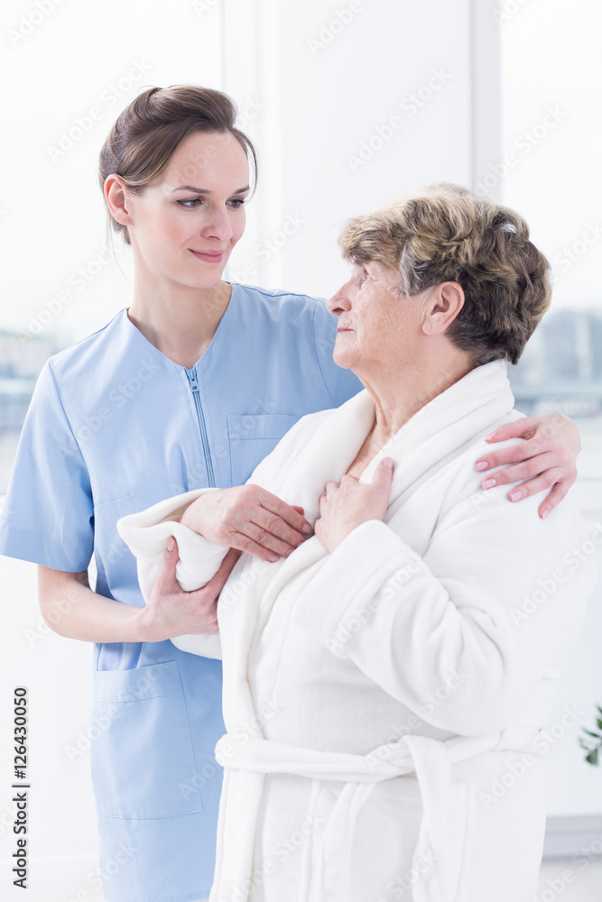 Fototapeta premium Senior woman and her nurse