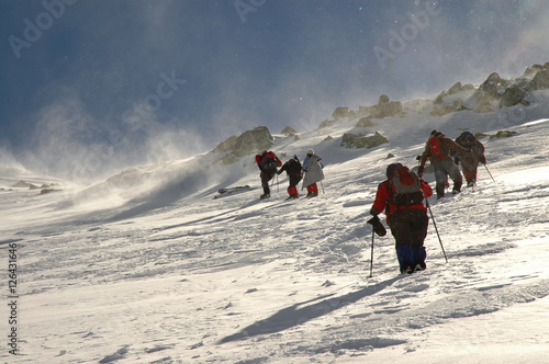 People hiking in beautiful winter mountains © salajean