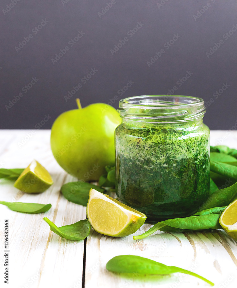 Healthy green smoothie with spinach, lime and apple Healthy green smoothie with spinach, lime and apple