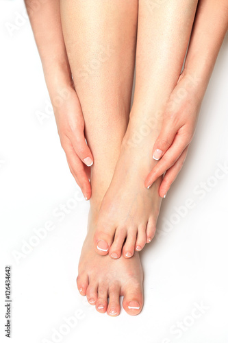 Beautiful feet with perfect spa french nail pedicure © panigystovska