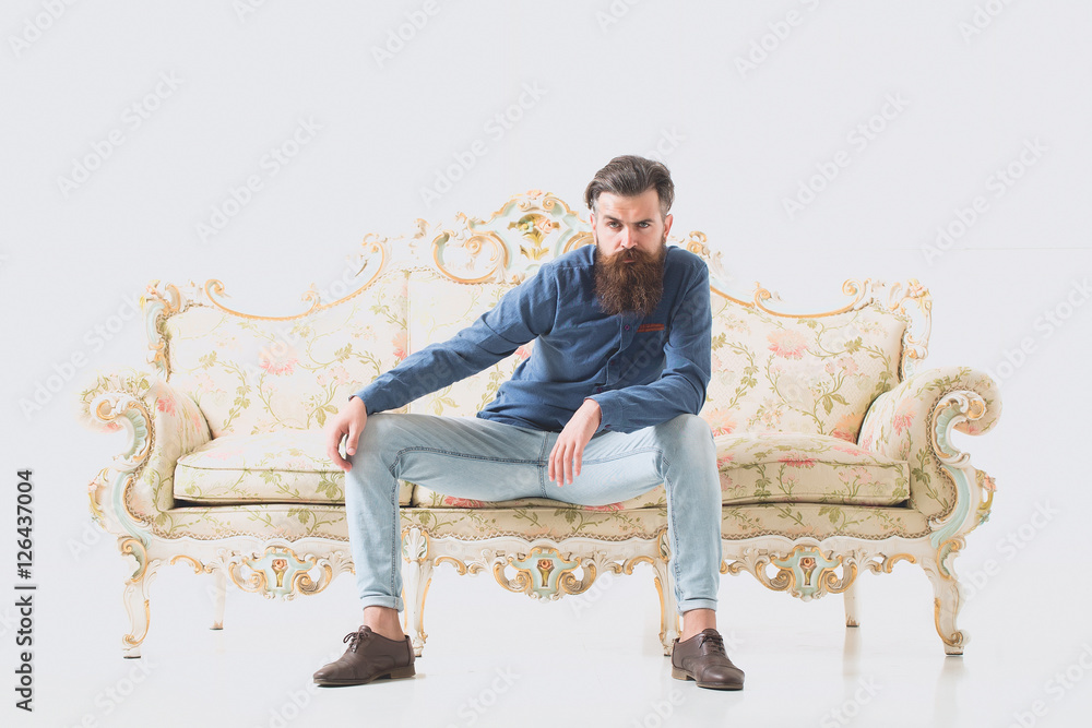 Handsome bearded man on couch Handsome bearded man on couch