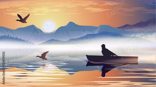 Man floating in a boat on the lake