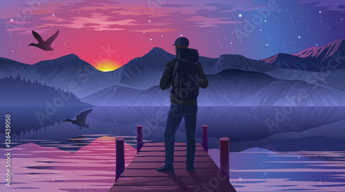 Man on the pier admiring the sunset