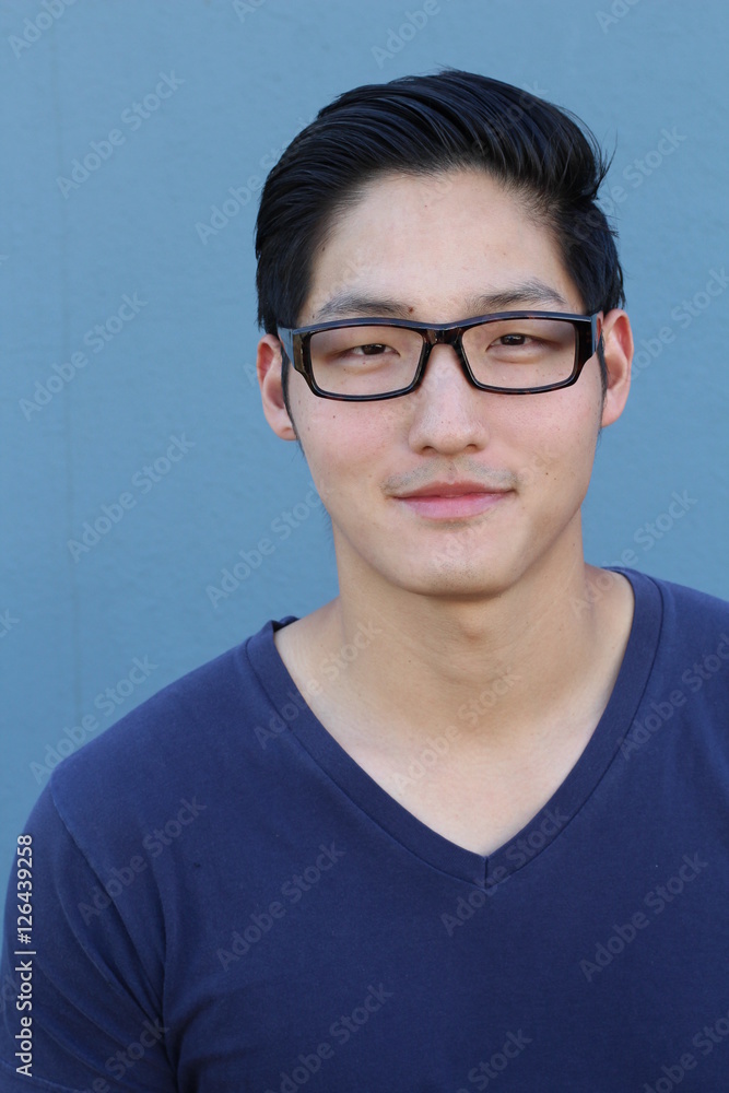 Portrait of a handsome Asian man with glasses Portrait of a handsome Asian man with glasses