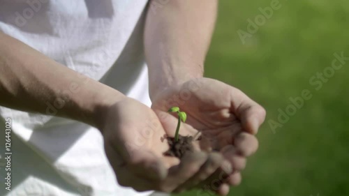 Plant Growing on Hands