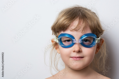 child in glasses for a scuba diving