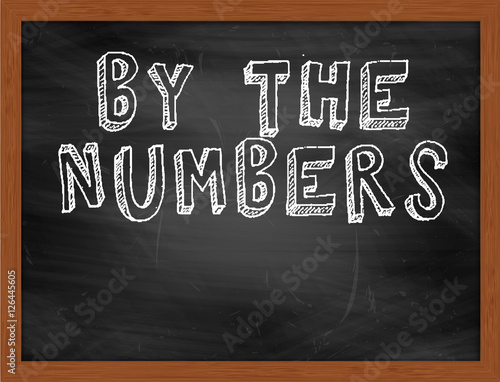 BY THE NUMBERS handwritten text on black chalkboard