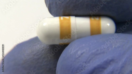 Wallpaper Mural Medicine capsule drug in extreme closeup Torontodigital.ca