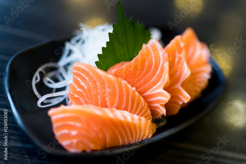 Sliced salmon sashimi, Japanese raw food delicious menu, famous fish from Norway