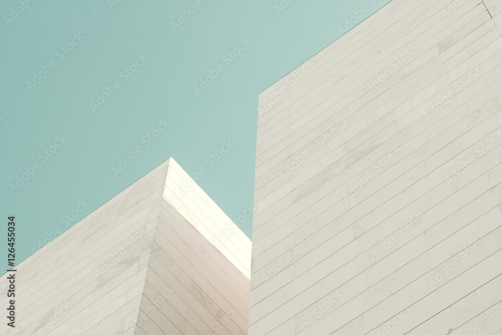 Fototapeta premium Architektura abstrakcyjna. Fragment elewacji budynku z kamiennych bloków