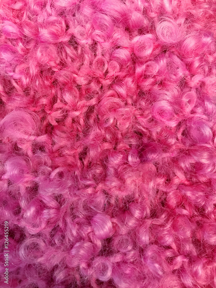 Fluffy pink wool which can be used as a background. Space for text. Fluffy pink wool which can be used as a background. Space for text.