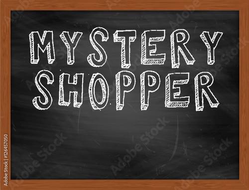 MYSTERY SHOPPER handwritten text on black chalkboard