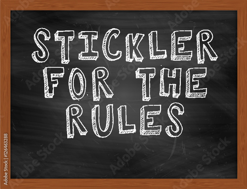 STICKLER FOR THE RULES handwritten text on black chalkboard