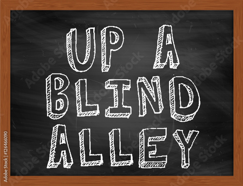 UP A BLIND ALLEY handwritten text on black chalkboard