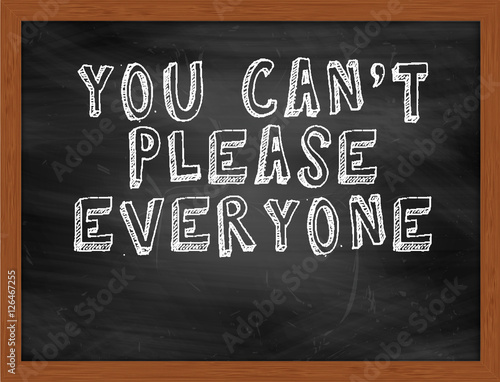 YOU CANT PLEASE EVERYONE handwritten text on black chalkboard