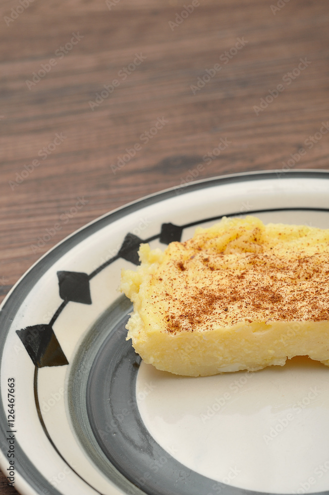 A slice of milk tart A slice of milk tart