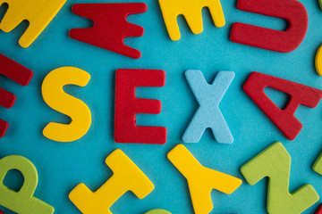 colorful words sex on blue background