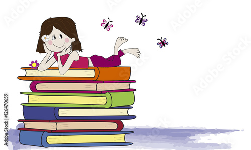 Niña tumbada sobre libros.